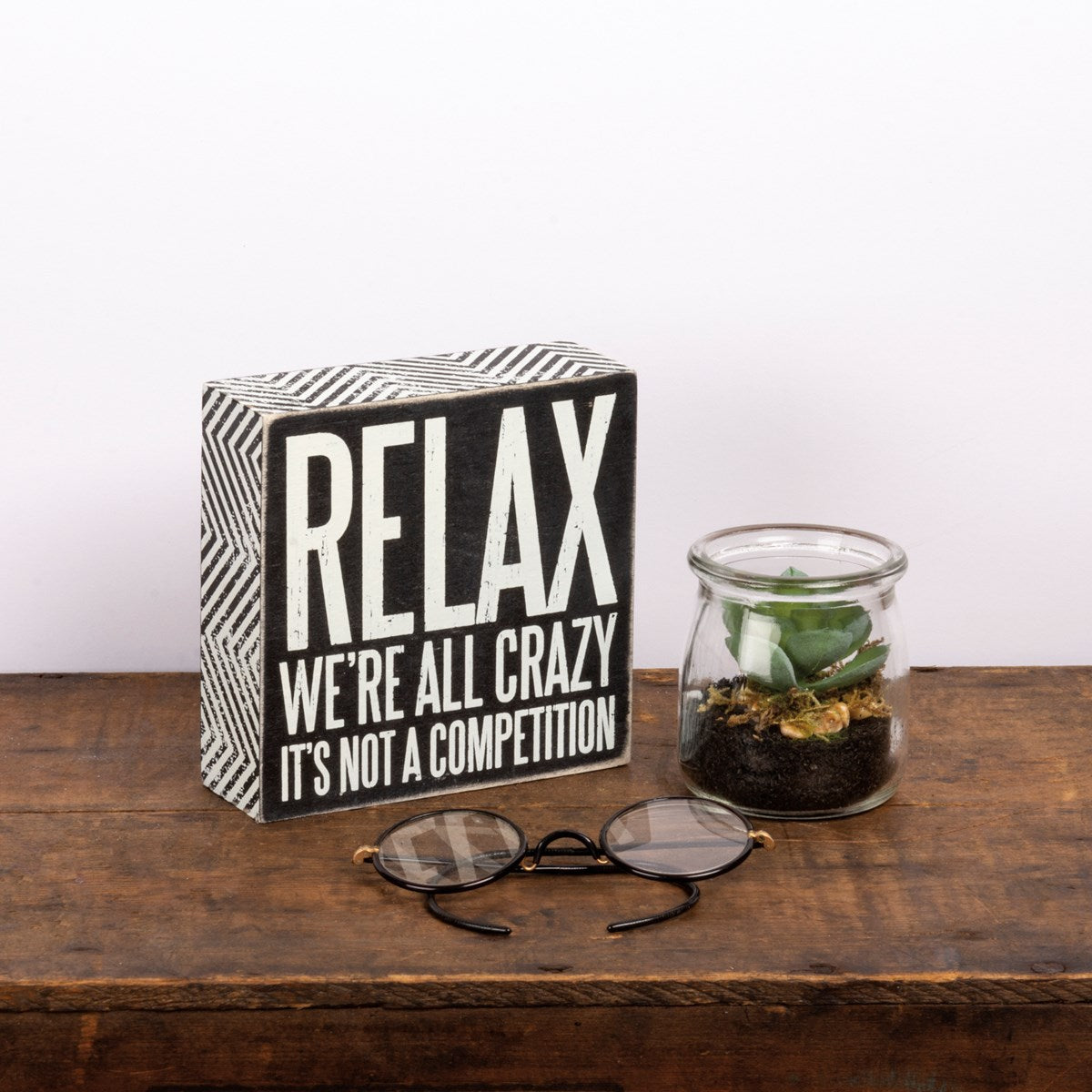 Relax We're All Crazy Box Sign