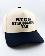 Put It On My Husband's Tab Trucker Hat