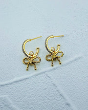 Catherine Bow Huggie Hoops