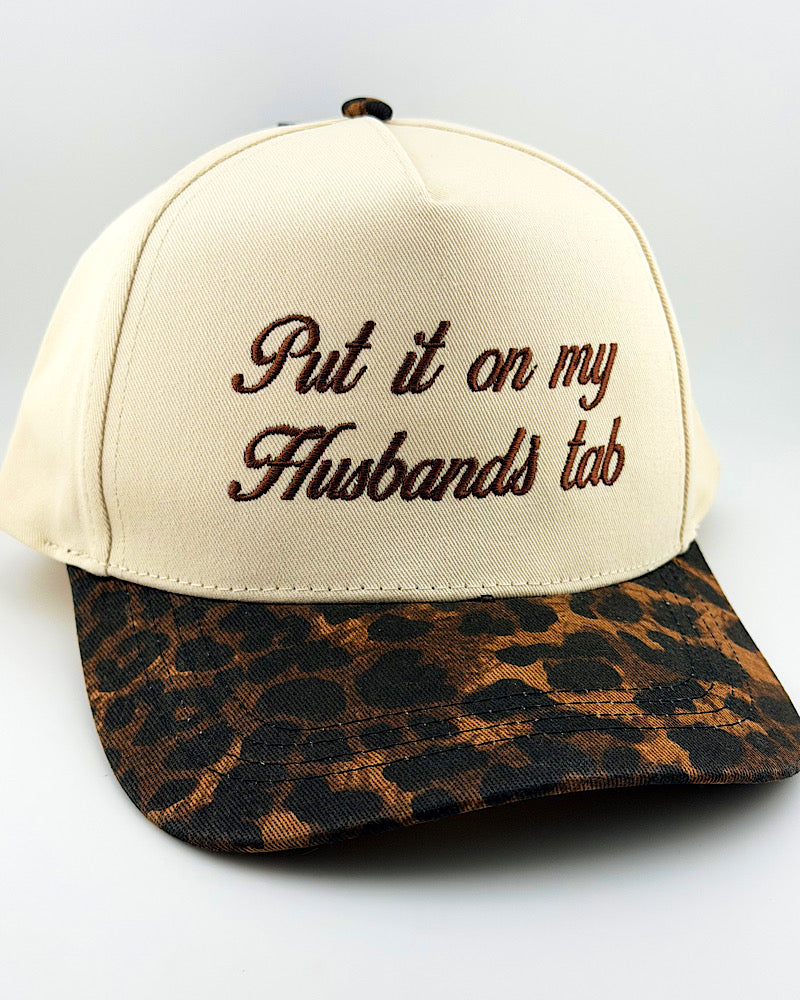 Put It On My Husband's Tab Trucker Hat